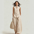 Women’s casualwear set from FitiqueFit featuring a stand collar sleeveless top and high-waist wide-leg pants, stylish and comfortable.