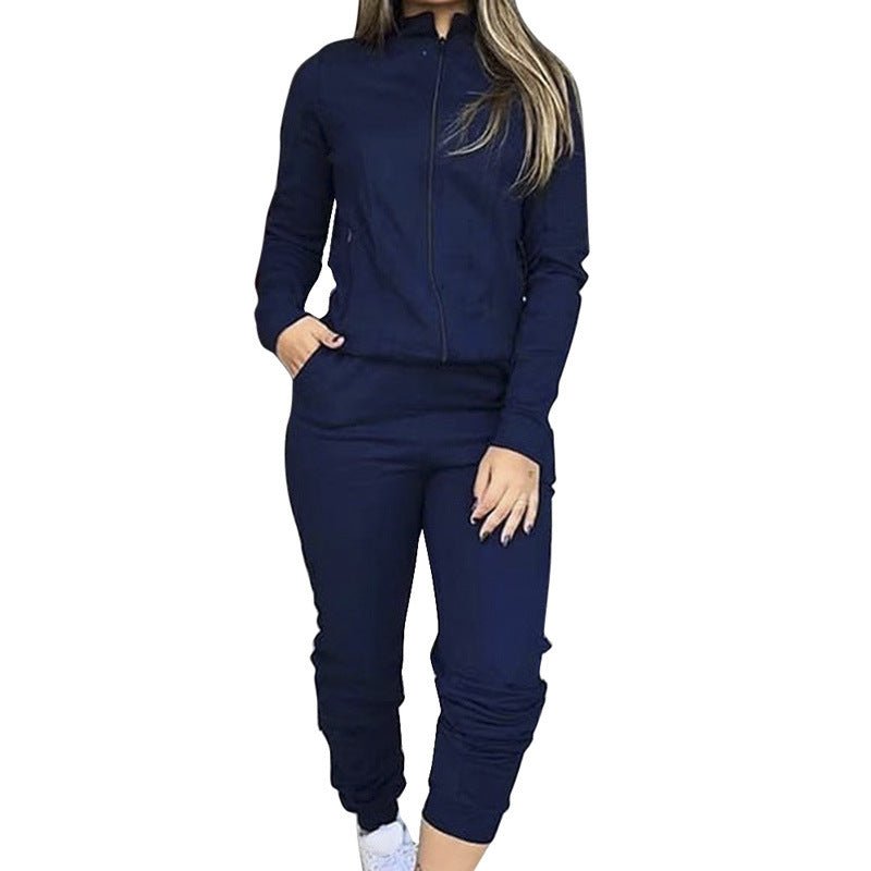 Women's street style two-piece casual suit by FitiqueFit, featuring a trendy top and matching pants, perfect for everyday wear.