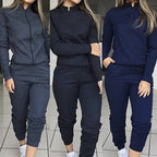 Women's street style two-piece casual suit by FitiqueFit, featuring a trendy top and pants for everyday comfort and fashion.
