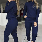 Women's street style two-piece casual suit by FitiqueFit, featuring a trendy top and matching pants in a relaxed fit.