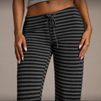 Women's striped wide-leg flared casual pants by FitiqueFit, featuring a relaxed fit and stylish vertical stripe pattern.
