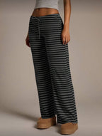 Women’s striped wide-leg flared casual pants by FitiqueFit, featuring a relaxed fit and bold stripe pattern.