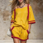 Women's summer contrast color-block patchwork shorts set by FitiqueFit, featuring a casual 2-piece outfit with vibrant color blocking.