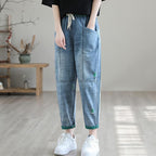 Women’s summer streetwear ripped Ninth jeans by FitiqueFit, featuring distressed details and a casual, trendy fit.