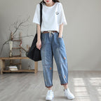 Women's summer fashion ripped Ninth jeans by FitiqueFit, showcasing distressed denim with a trendy streetwear style.