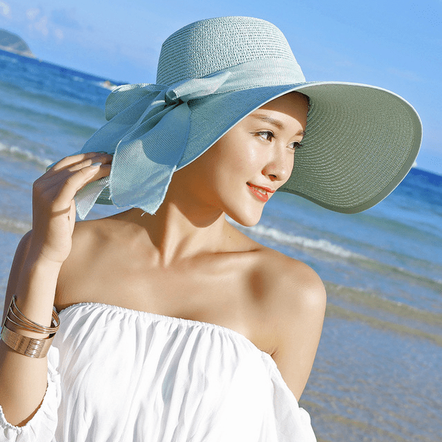 Women's summer straw hat by FitiqueFit featuring wide brim and woven design, perfect for sunny outdoor wear.