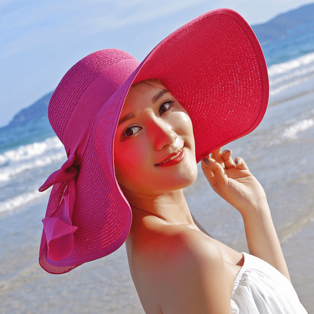 Women's summer straw hat from FitiqueFit featuring wide brim and woven design, perfect for sun protection and stylish summer wear.
