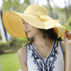 Women’s summer straw hat by FitiqueFit featuring a wide brim and woven design, perfect for sunny outdoor wear.