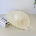 Women’s summer straw hat from FitiqueFit featuring a wide brim and breathable design for sun protection.