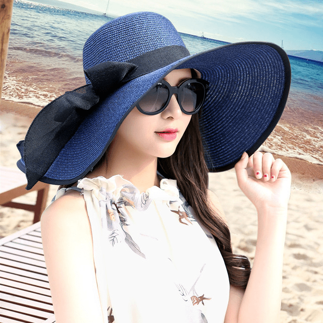 Women’s summer straw hat by FitiqueFit featuring a wide brim, perfect for sun protection and stylish summer outfits.