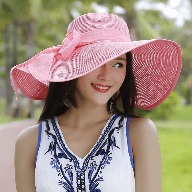 Women’s summer straw hat by FitiqueFit featuring a wide brim and lightweight woven design for sun protection.