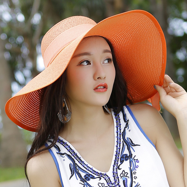 Women’s summer straw hat by FitiqueFit featuring a wide brim and woven design, perfect for sunny outdoor wear.