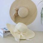 Women’s summer straw hat by FitiqueFit featuring wide brim and woven straw design, perfect for sun protection and stylish summer wear.