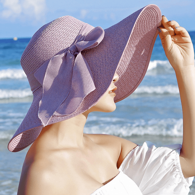 Women’s summer straw hat by FitiqueFit, featuring wide brim and breathable woven straw for sun protection and stylish summer wear.