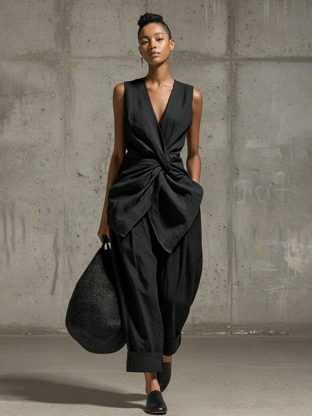 Women's casualwear set featuring a sleeveless tie-front V-neck top and wide-leg pants by FitiqueFit.