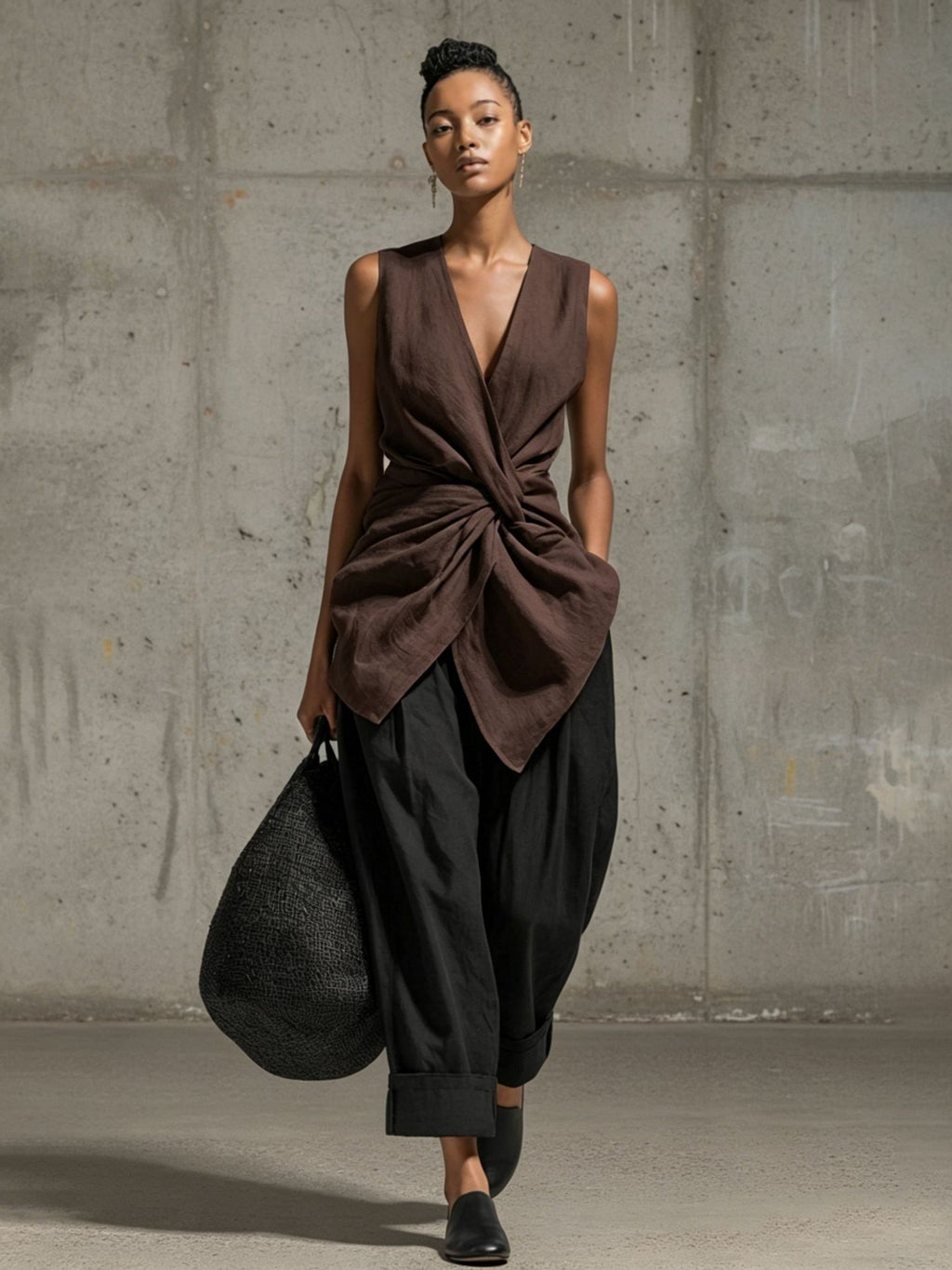 Women's casual tie-front V-neck sleeveless top with wide-leg pants set by FitiqueFit, shown on a model in a relaxed pose.