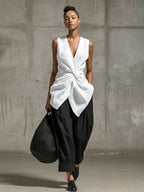 Women's tie-front V-neck sleeveless top and wide-leg pants set by FitiqueFit, shown together as casualwear ensemble.