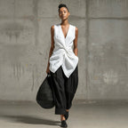 Women's casualwear set by FitiqueFit with a tie-front V-neck sleeveless top and wide-leg pants, stylish and comfortable for everyday wear.