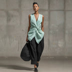 Women's casualwear set with tie-front V-neck sleeveless top and wide-leg pants by FitiqueFit, styled for a relaxed look.