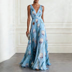 Women's tulip print sleeveless V-neck A-line maxi dress by FitiqueFit in 7 colors, featuring a flowy silhouette and vibrant floral design.