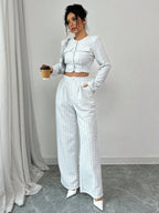 Women’s tweed pearl-button jacket and pants set by FitiqueFit, casualwear with stylish tailored fit and classic textured fabric.