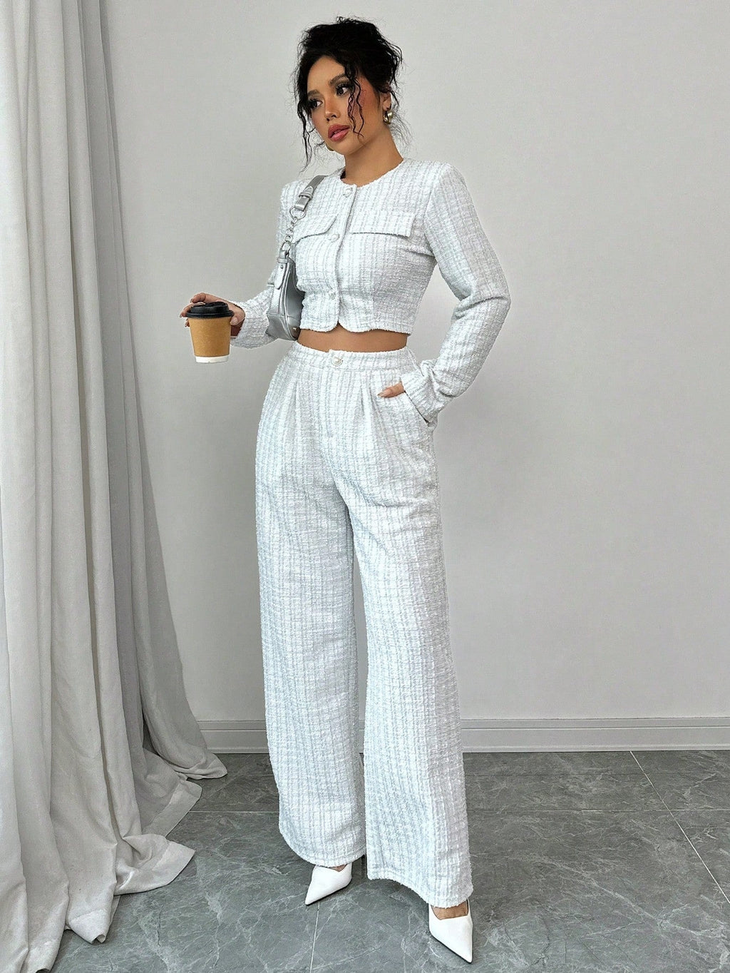 Women’s tweed pearl-button jacket and pants set by FitiqueFit, casualwear with a stylish, textured tweed fabric and elegant pearl details.