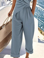 Plus size women's twist-front V-neck lounge set with pockets, featuring comfortable fabric and relaxed fit for casual wear.