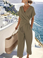 Plus size women's twist-front V-neck lounge set with pockets, stylish and comfortable clothing set by Trendsi.