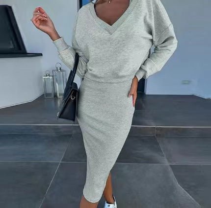 Women's two-piece dress suit with long-sleeved V-neck pullover sweatshirt and sleeveless dress set, stylish and comfortable for casual wear.