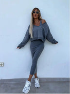 Women's two-piece dress suit by LadyShow.Store featuring a long-sleeved V-neck pullover and sleeveless dress set.