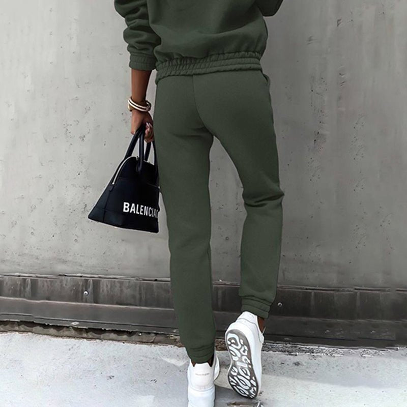 Women’s two-piece solid color hooded sweatshirt set by FitiqueFit, featuring a casual hoodie and matching sweatpants.