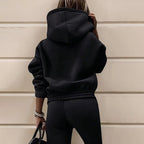 Women’s two-piece solid color hooded sweatshirt set by FitiqueFit, featuring a casual hoodie and matching sweatpants.