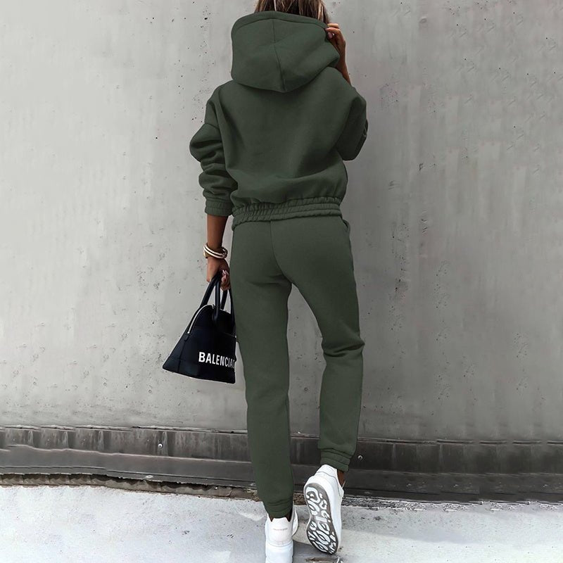 Women's two-piece solid color hooded sweatshirt set by FitiqueFit, featuring a cozy hooded top and matching pants for casual wear.