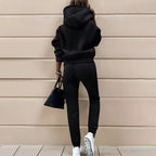 Women's solid color hooded sweatshirt set by FitiqueFit, featuring a casual two-piece design with a hood and comfortable fit.