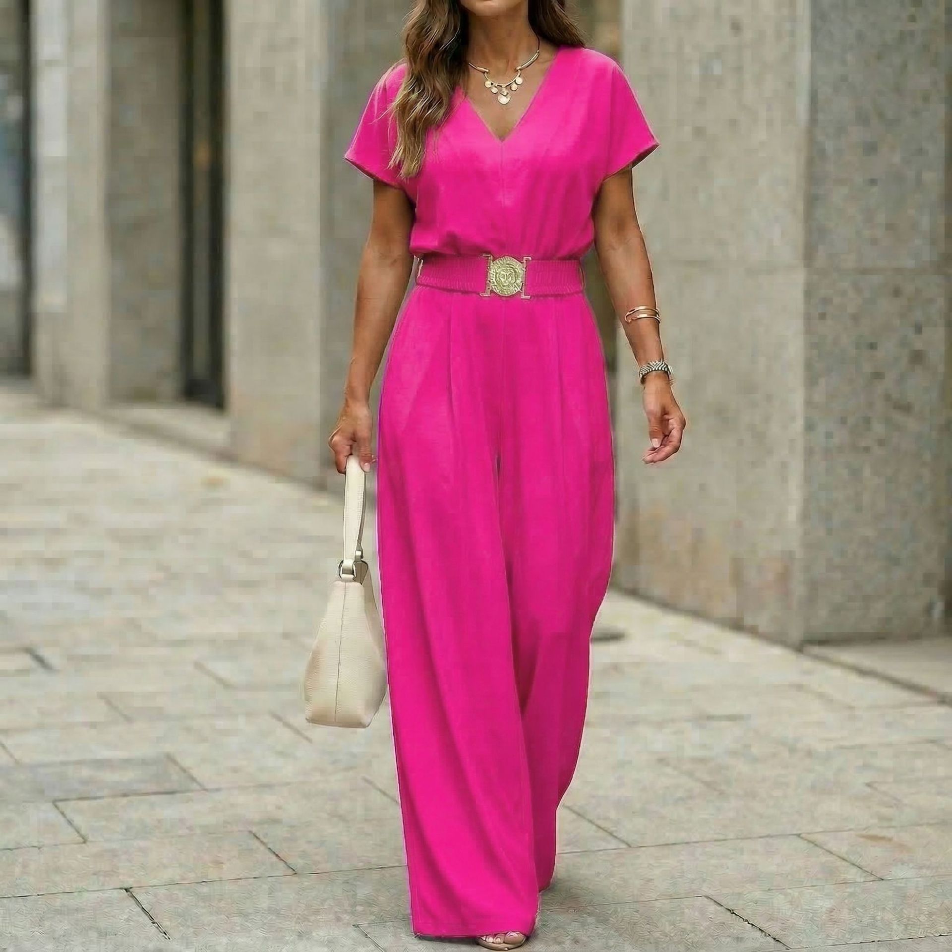 Women's V-neck belted wide-leg jumpsuit by FitiqueFit, casualwear with a V-neckline, belt at waist, and flowing wide-leg design.