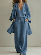 Women's V-neck cardigan coat, pocket vest, and long pants casualwear three-piece set by FitiqueFit, shown laid flat.