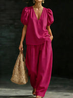 Women’s V-neck casual two-piece set by FitiqueFit featuring a relaxed fit top and matching pants, perfect for comfortable everyday wear.