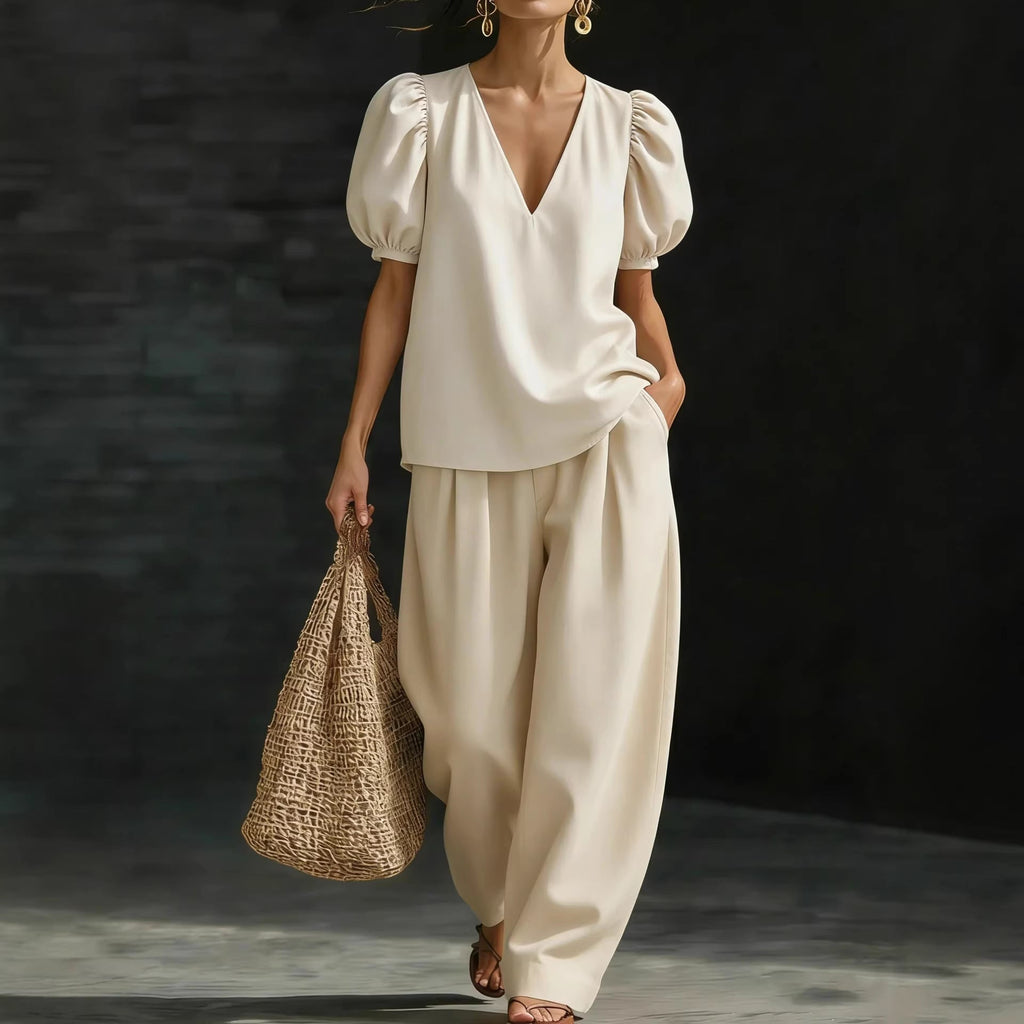 Women’s V-neck casual two-piece set by FitiqueFit, featuring a relaxed V-neck top and matching pants, perfect for everyday wear.