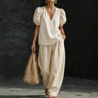 Women’s V-neck casual two-piece set by FitiqueFit, featuring a relaxed V-neck top and matching pants, perfect for everyday wear.