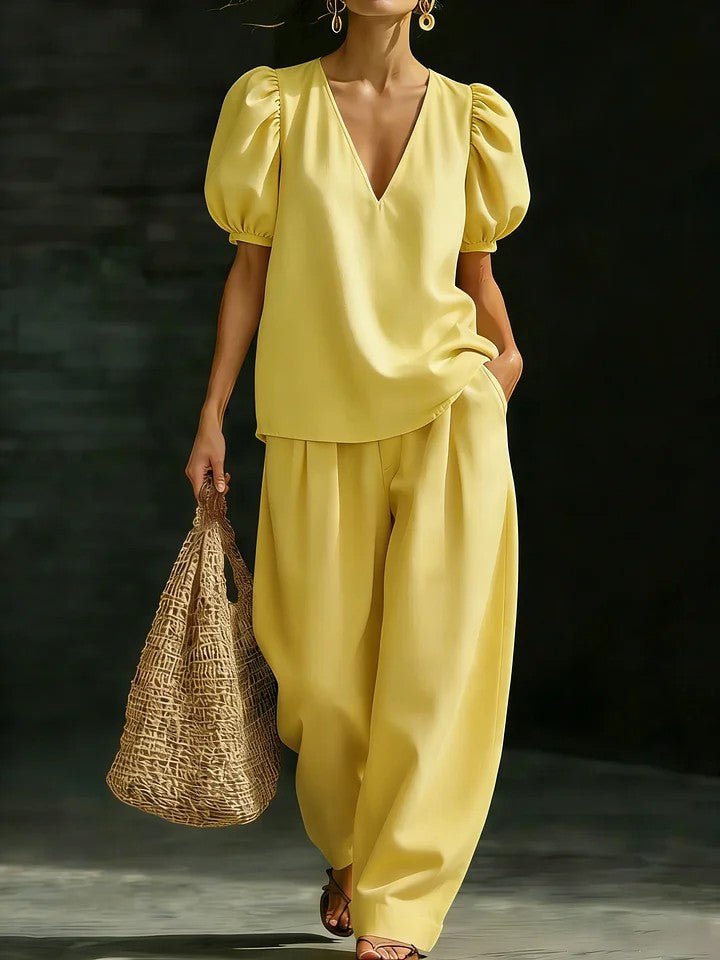 Women’s V-neck casual two-piece set by FitiqueFit, featuring a relaxed V-neck top and matching pants, perfect for everyday wear.