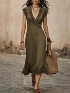 Women's V-neck cotton-linen midi dress with flutter sleeves and ruffle trim, casualwear by FitiqueFit, shown on a model.