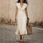 Women's V-neck cotton-linen midi dress with flutter sleeves and ruffle trim, by FitiqueFit, perfect for casualwear.