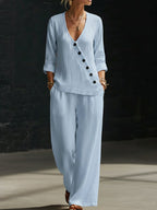 Women’s V-neck crossover shirt and wide-leg pants set by Plush Fashion Hub, casualwear with relaxed fit and stylish design.