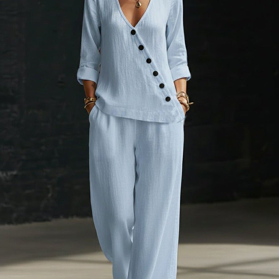 Women’s V-neck crossover shirt and wide-leg pants casualwear set by Plush Fashion Hub, displayed on a model.