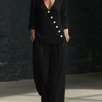 Women’s V-neck cross-over shirt and wide-leg pants set in casualwear by Plush Fashion Hub, displayed on a model.