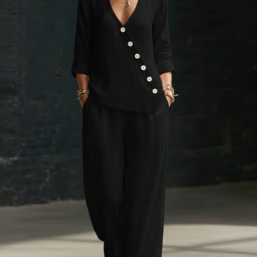 Women’s V-neck cross-over shirt and wide-leg pants set in casualwear by Plush Fashion Hub, displayed on a model.