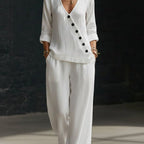 Women’s V-neck cross-over shirt and wide-leg pants set by Plush Fashion Hub, casual wear, front view showing relaxed fit and stylish design.