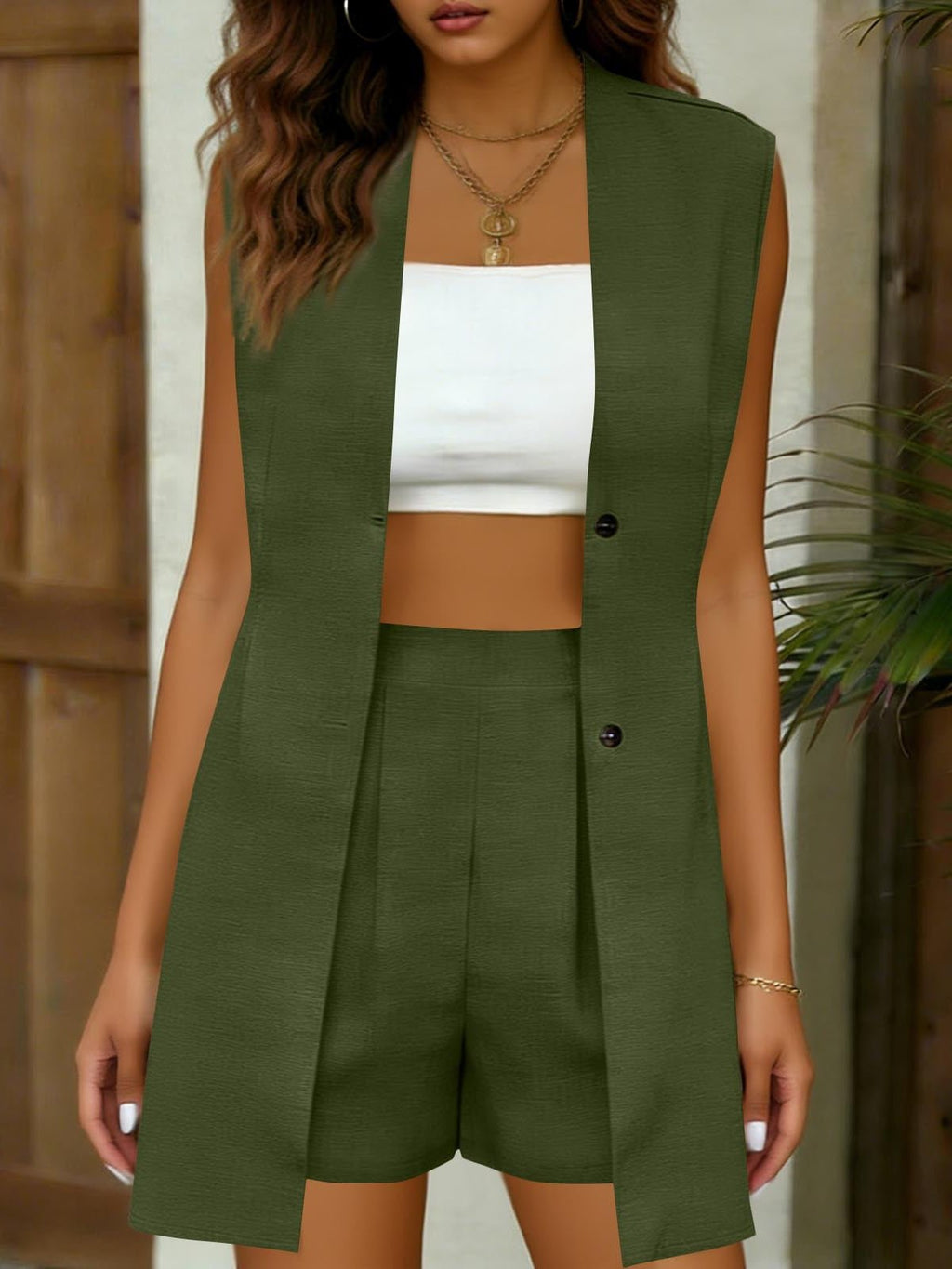 Women's V-neck sleeveless vest jacket and shorts set by FitiqueFit, casualwear for elegant commuter style, shown on a model.