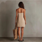 Women's V-neck slip mini dress with fringe trim, sleeveless streetwear style by FitiqueFit, perfect for casual wear.