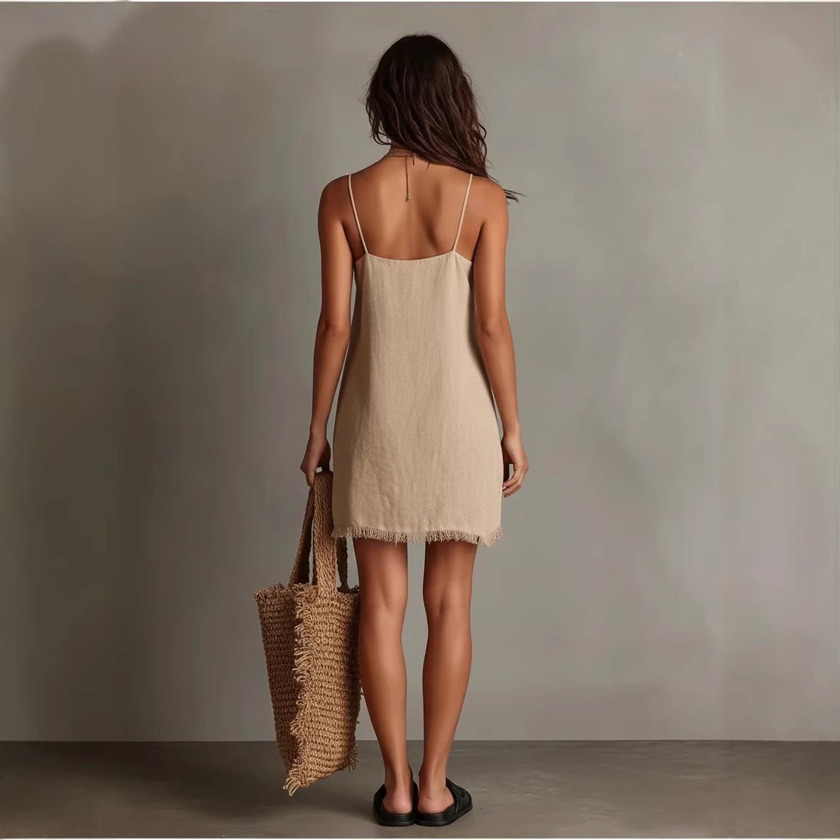 Women's V-neck slip mini dress with fringe trim, sleeveless streetwear style by FitiqueFit, perfect for casual wear.